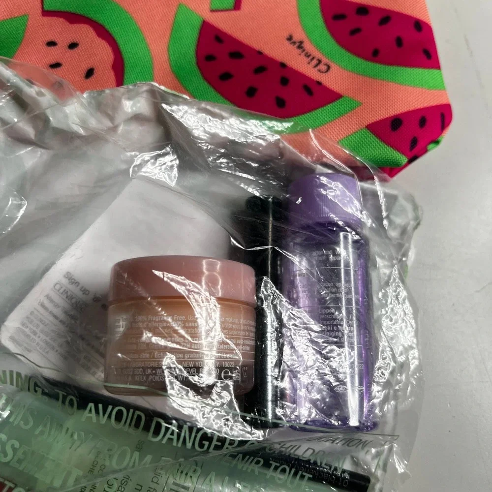 Clinique x Donald Robertson Watermelon Makeup Bag & 6pc Travel Skincare Gift Set